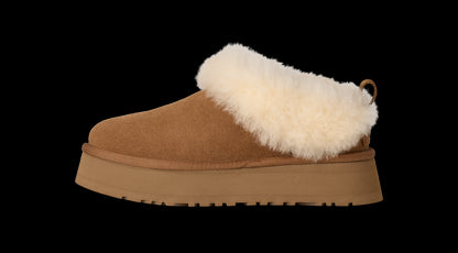 Brown slipper with white fur trim on a white background